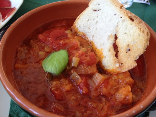 Stale bread with tomatoes & garlic served warm at Osteria del Borgo